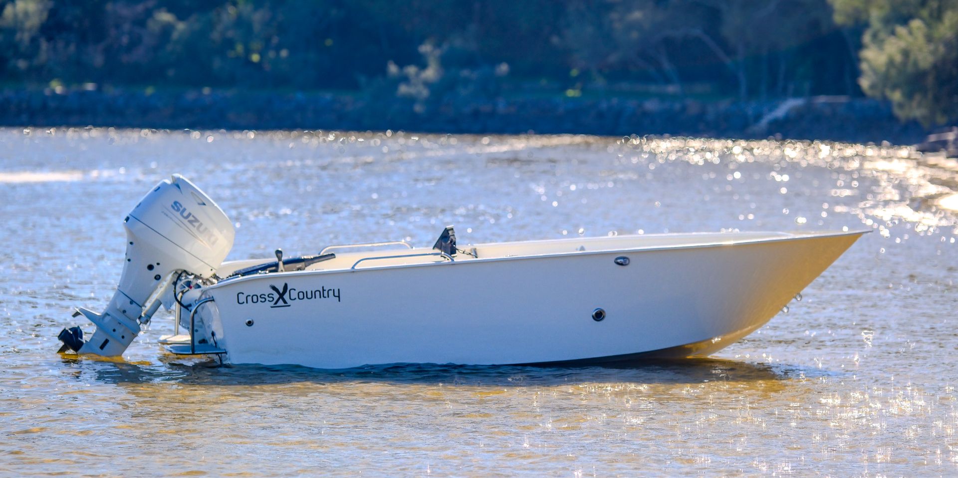 Cross X Country boat sitting on water